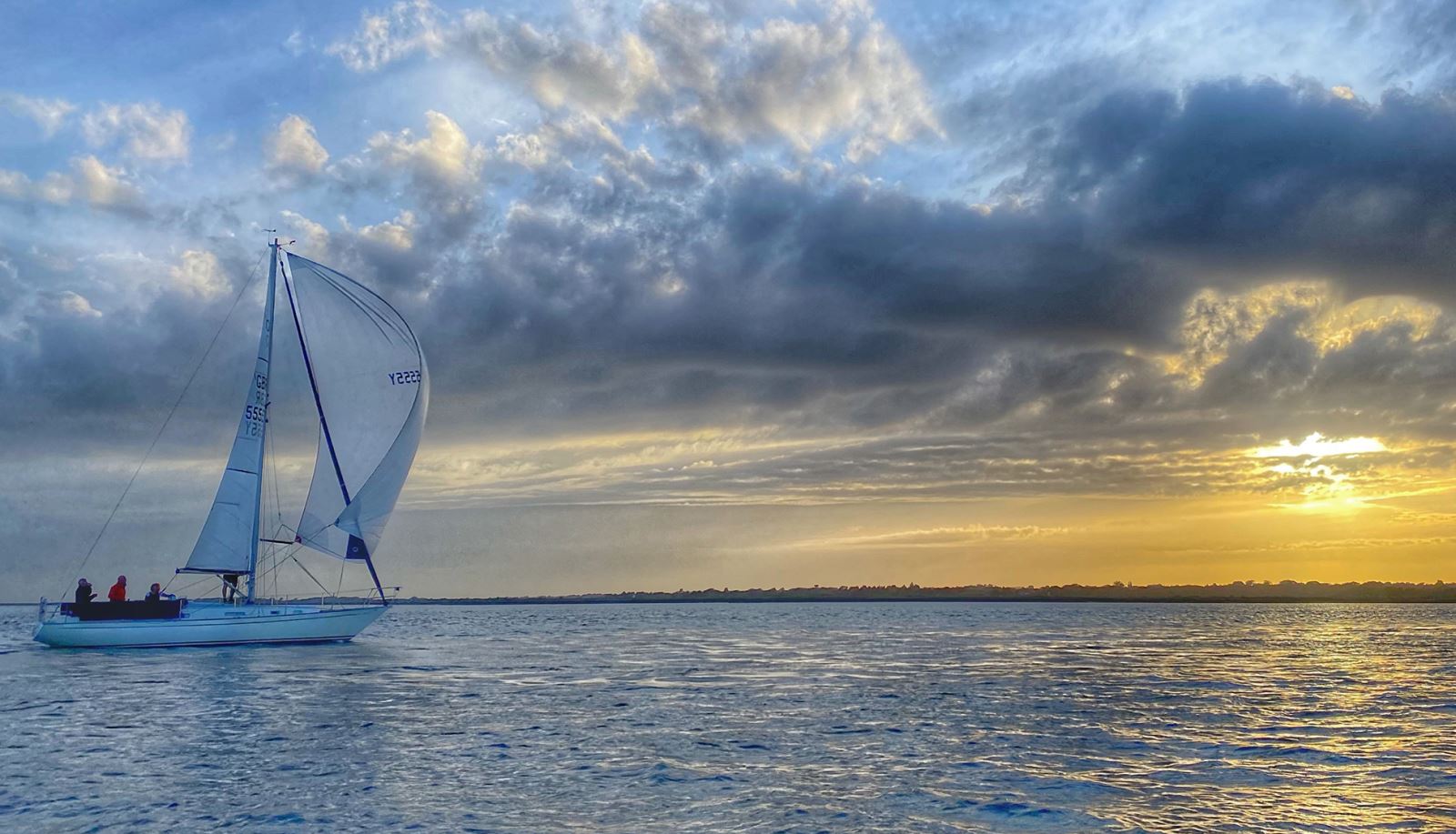 Yacht sailing into Lymington